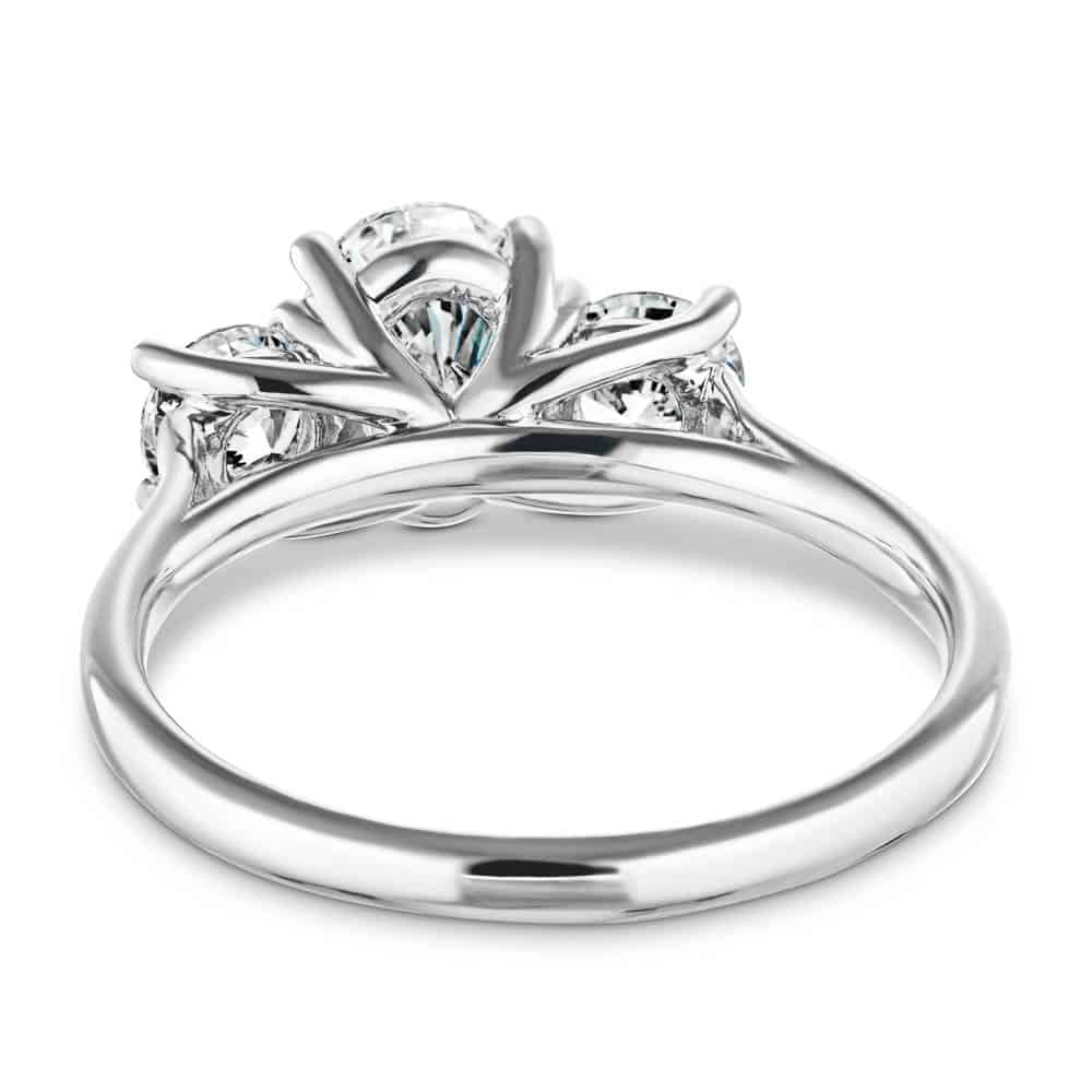 Shown with 1ct Oval Cut and Two 0.5ct Round Cut Lab Grown Diamonds in 14k White Gold|Three stone trellis set engagement ring in white gold shown from back