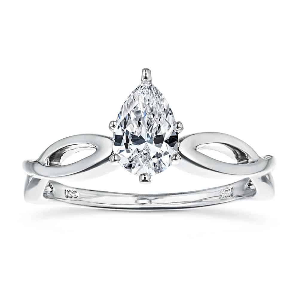 Shown with 1ct Pear Cut Lab Grown Diamond in 16k White Gold|Modern solitaire engagement ring with a 1ct pear cut lab grown diamond in twisted metal design 16k white gold band