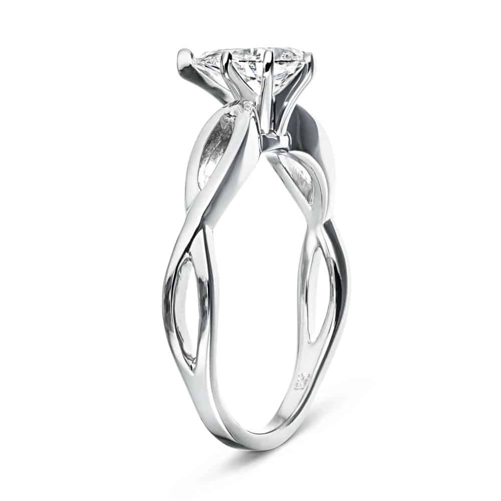 Shown with 1ct Pear Cut Lab Grown Diamond in 16k White Gold|Solitaire engagement ring with a 1ct pear cut lab grown diamond in twisted metal design 16k white gold band shown from side