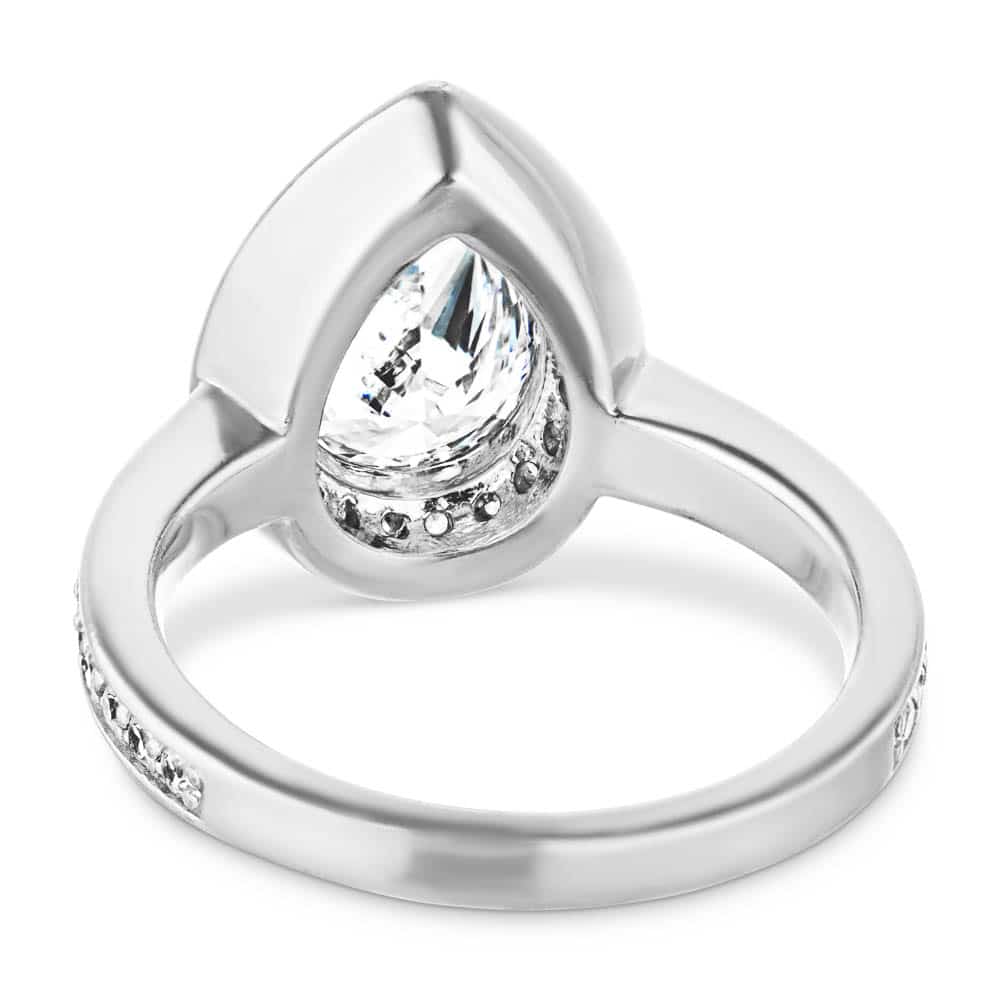 Shown with a 1.0ct Pear cut Lab-Grown Diamond with a diamond accented halo and band in recycled 14K white gold | french engagement ring Shown with a 1.0ct Pear cut Lab-Grown Diamond with a diamond accented halo and band in recycled 14K white gold