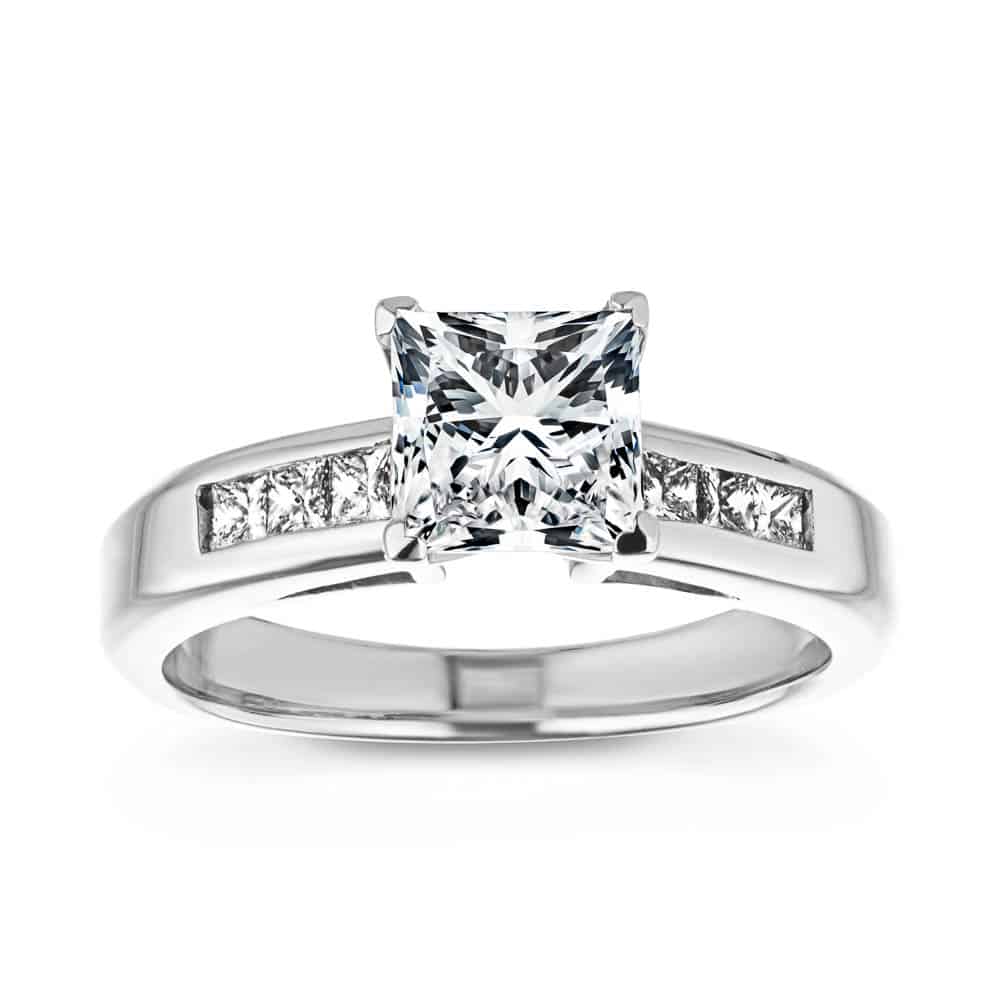 Shown with 1ct Princess Cut Lab Grown Diamond in 14k White Gold|Conflict free engagement ring with cathedral style 1ct princess cut lab grown diamond in channel set diamond accented 14k white gold band