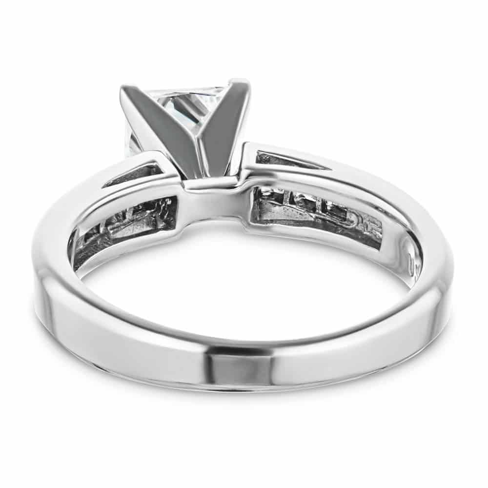 Shown with 1ct Princess Cut Lab Grown Diamond in 14k White Gold|Cathedral style engagement ring with 1ct princess cut lab diamond in channel set diamond accented 14k white gold band shown from back