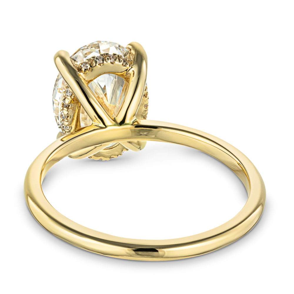 Shown In 14K Yellow Gold With An Oval Cut Center Stone|hidden halo solitaire ring set with an oval cut lab grown diamond center stone