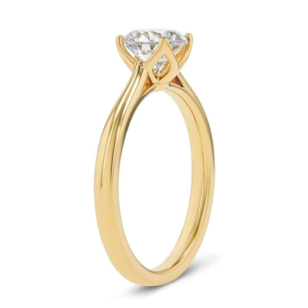 Shown here with a 1.0ct Round Cut Lab Grown Diamond center stone in 14K Yellow Gold|solitaire engagement ring with nature inspired floral prong head with lab grown diamond center stone set in 14k yellow gold metal