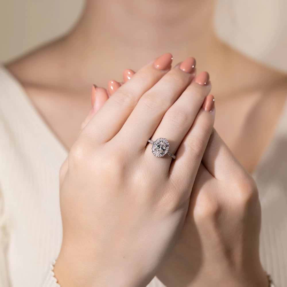 Shown In 14K White Gold with an Oval Cut Center Stone|vintage halo lab grown diamond ring with an oval cut lab grown diamond center stone 