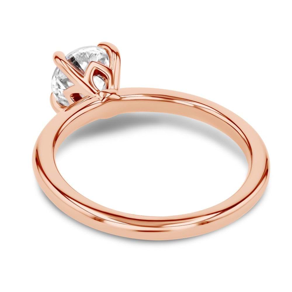 Shown here with a 1.0ct Round Cut Lab Grown Diamond center stone in 14K Rose Gold|shown with 1 carat lab grown diamond center stone with nature inspired floral prong head set in 14k rose gold
