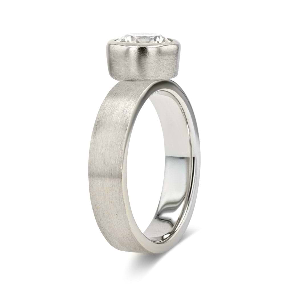 Shown in 14K White Gold with a Satin Finish|bezel set solitaire engagement ring with satin finish in 14k white gold metal