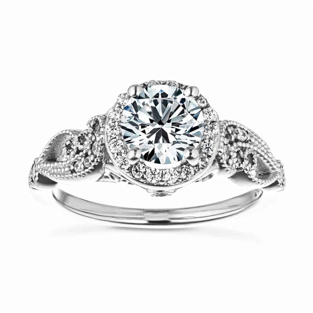 Shown with 1ct Round Cut Lab Grown Diamond in 14k White Gold|Unique vintage style diamond accented halo engagement ring with 1ct round cut lab created diamond with milgrain and filigree detailing in two tone 14k white gold