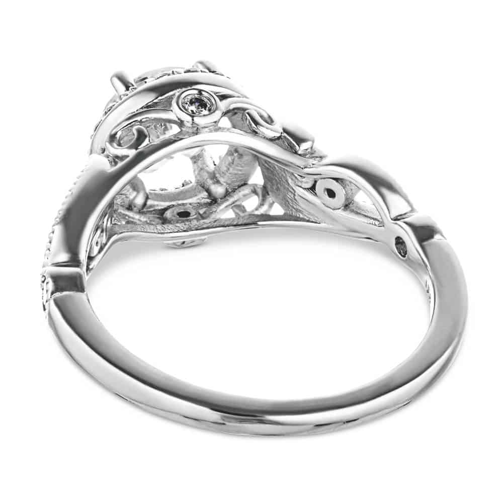 Shown with 1ct Round Cut Lab Grown Diamond in 14k White Gold|Vintage style diamond accented halo engagement ring with 1ct round cut lab created diamond with milgrain and filigree detailing in two tone 14k white gold shown from back