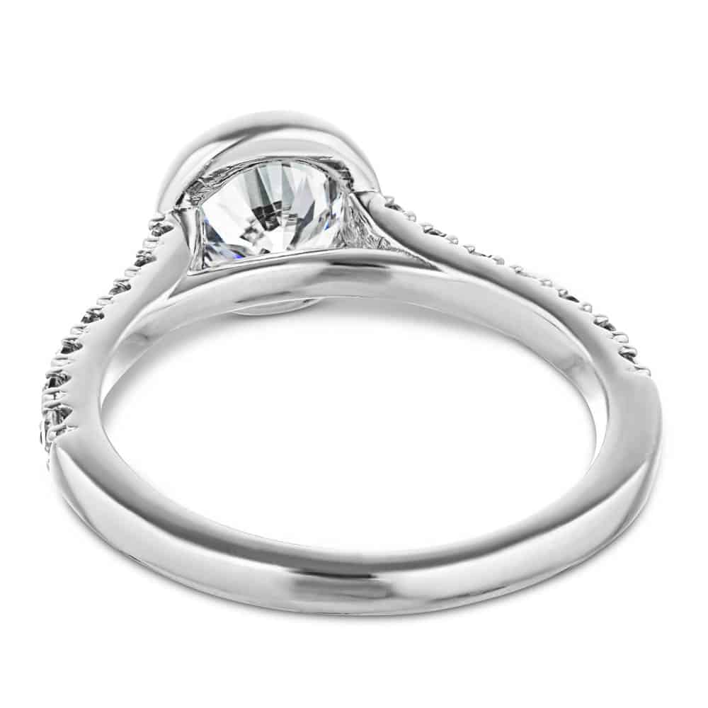 Shown with a bezel set 1.0ct Round cut Lab-Grown Diamond with accenting stones on the band in recycled 14K white gold | stackable engagement ring Shown with a bezel set 1.0ct Round cut Lab-Grown Diamond with accenting stones on the band in recycled 14K white gold