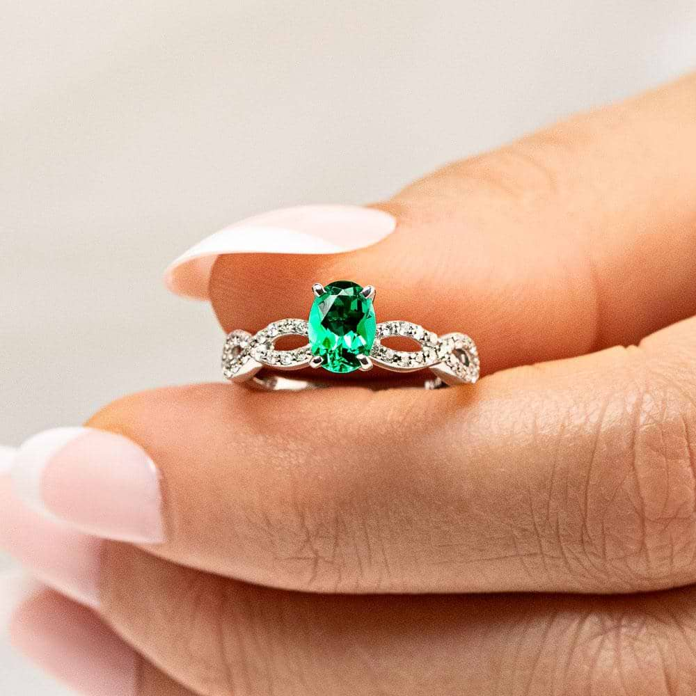 Shown with 1ct Round Cut Lab Created Emerald in 14k White Gold