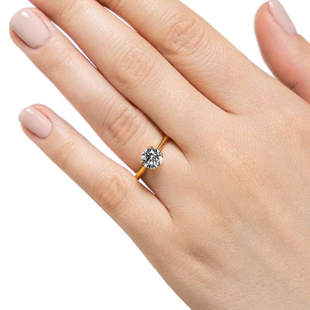 Shown with 1ct Round cut Lab Grown Diamond in 14k Yellow Gold|Modern futuristic sci-fi solitaire engagement ring with unique knife edge shank and double prong head holding a 1ct round cut lab created diamond in 14k yellow gold