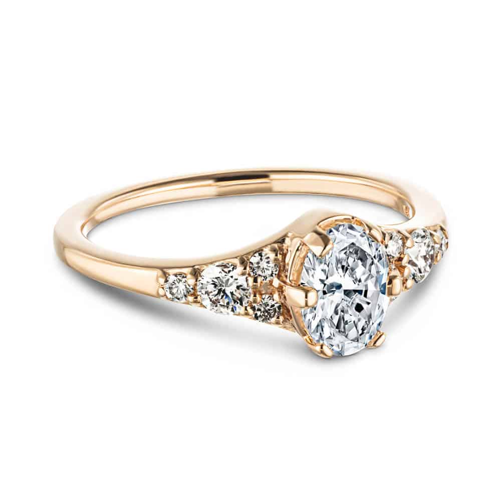 Shown with a 1.0ct Oval cut Lab-Grown Diamond in recycled 14K rose gold with accenting stones