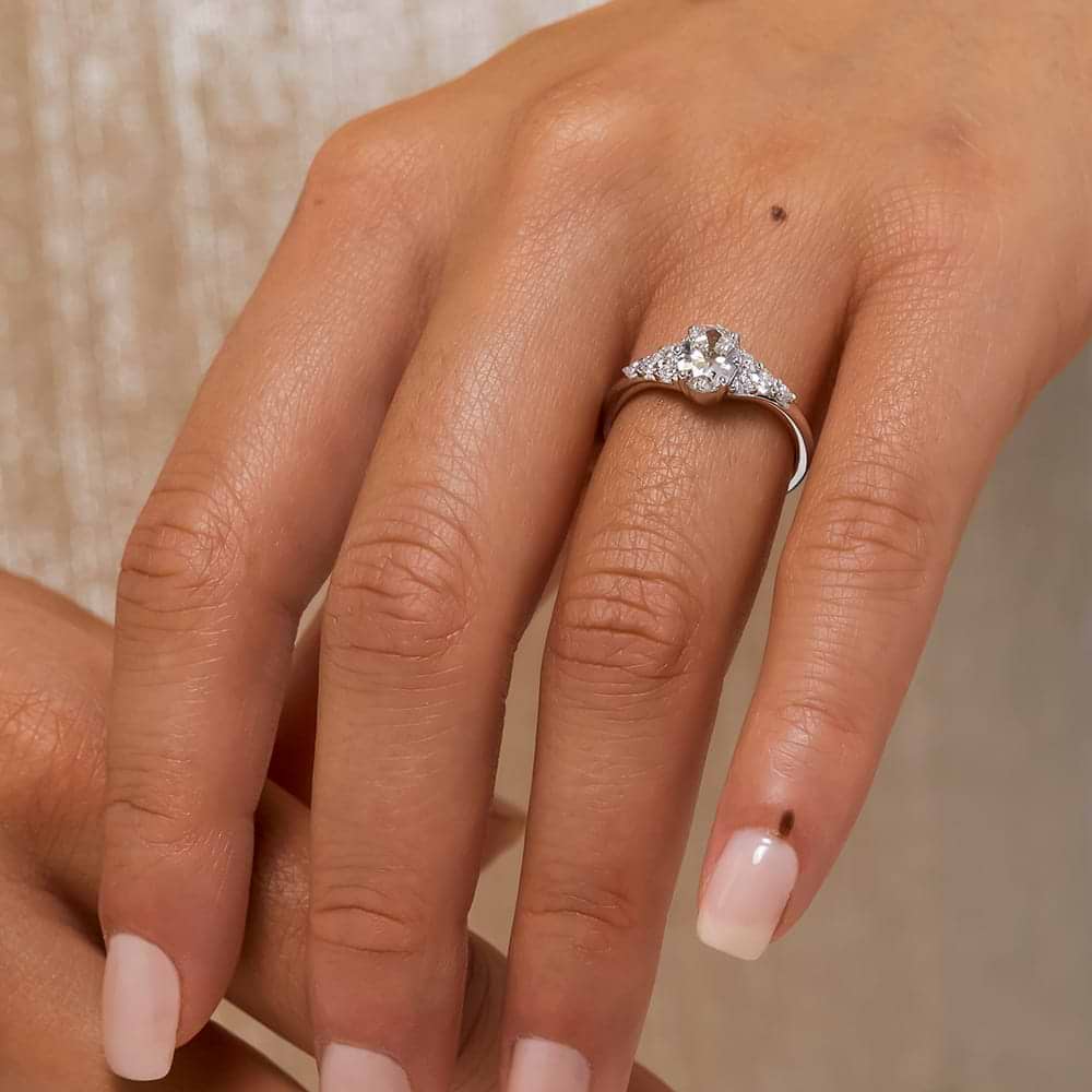 Shown with a 1.0ct Oval cut Lab-Grown Diamond in recycled 14K yellow gold with accenting stones