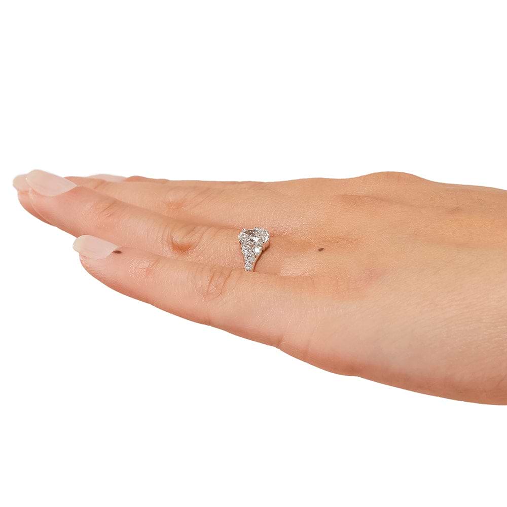 Shown with a 1.0ct Oval cut Lab-Grown Diamond in recycled 14K yellow gold with accenting stones
