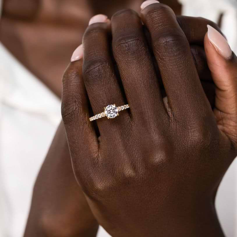 Shown here with a 1.0ct Round Cut Lab Grown Diamond center stone in 14K Yellow Gold