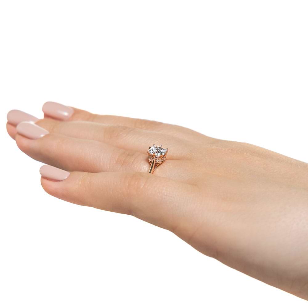 Shown with a 1ct Cushion cut Lab Grown Diamond in 14k Rose Gold|Hidden halo engagement ring with 8 prongs holding a 1ct cushion cut lab grown diamond in 14k rose gold