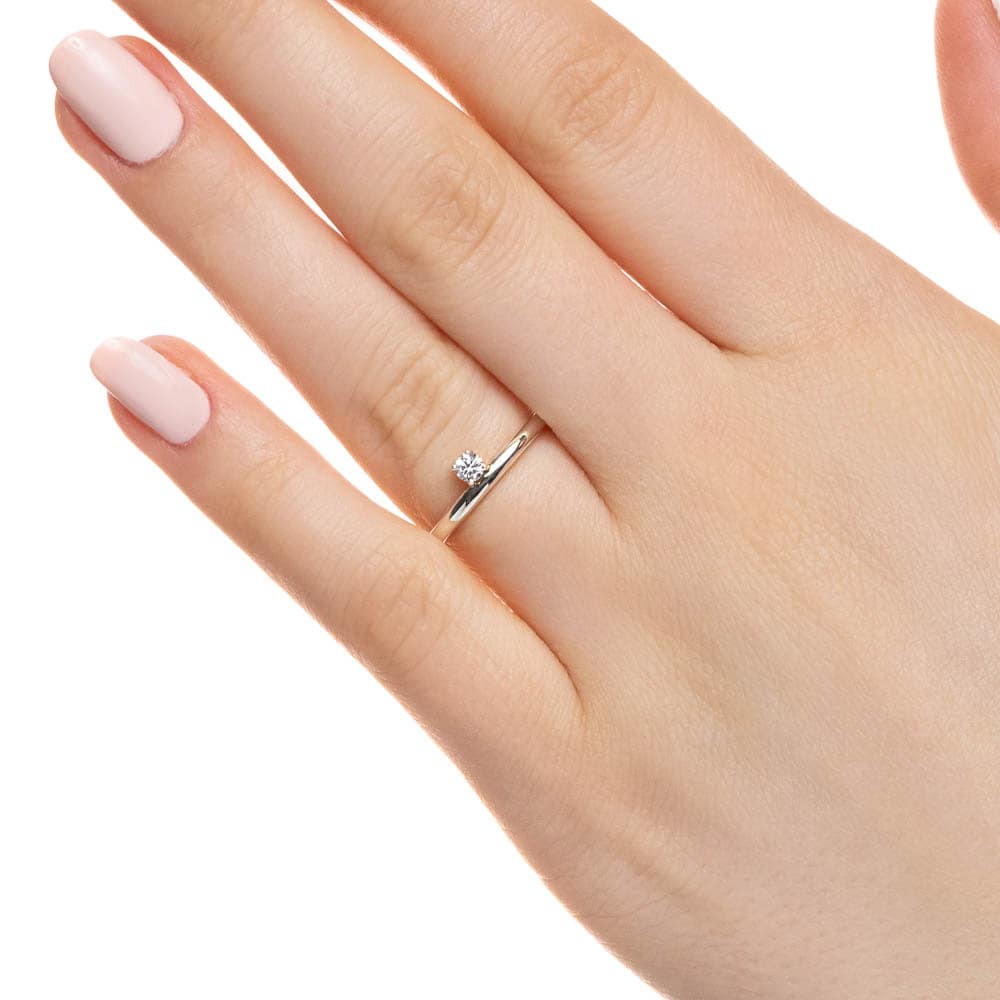 Shown with 0.10ct Lab Grown Diamond in 14k White Gold|Unique asymmetrical stackable ring with 0.10ct round cut lab grown diamond in 14k white gold shown worn on hand
