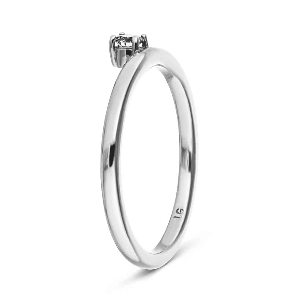 Shown with 0.10ct Lab Grown Diamond in 14k White Gold|Unique asymmetrical stackable ring with 0.10ct round cut lab grown diamond in 14k white gold shown from side