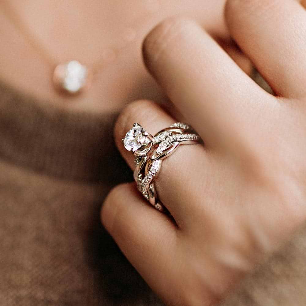 Shown with matching wedding band available as set|Nature inspired wedding ring set with diamond accented band in 14k white gold