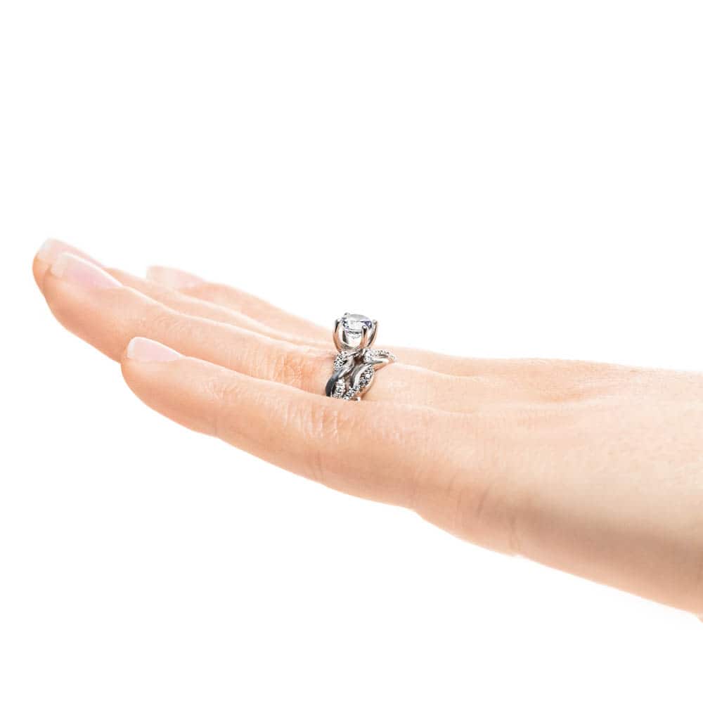 Matching Wedding Set shown with a 1.0ct round cut Lab-Grown Diamond with accenting stones in recycled 14K white gold | diamond accented engagement ring and matching wedding band Shown with a 1.0ct round cut Lab-Grown Diamond with accenting stones in recycled 14K white gold