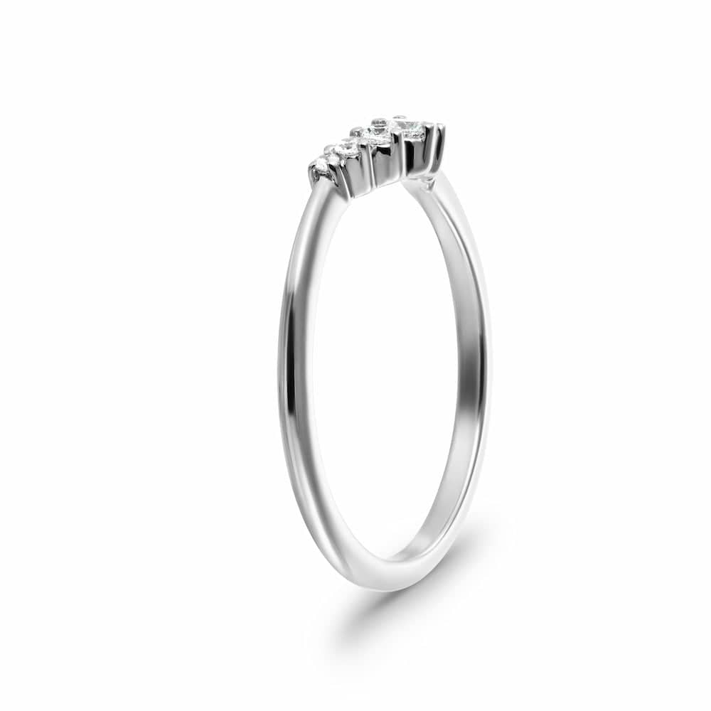 Shown in 14k White Gold|Graduated lab grown diamond accented v wedding band with stackable contour design set in 14k white gold shown from side