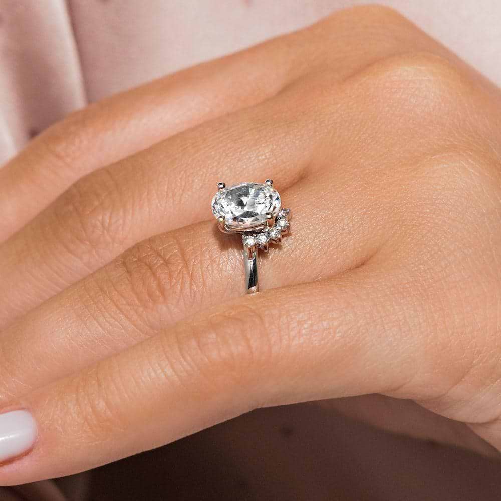 Shown with 1.5ct Oval Cut Lab Grown Diamond in 14k White Gold|Elegant vintage style half halo engagement ring with 1.5ct oval cut lab grown diamond in 14k white gold shown worn on hand