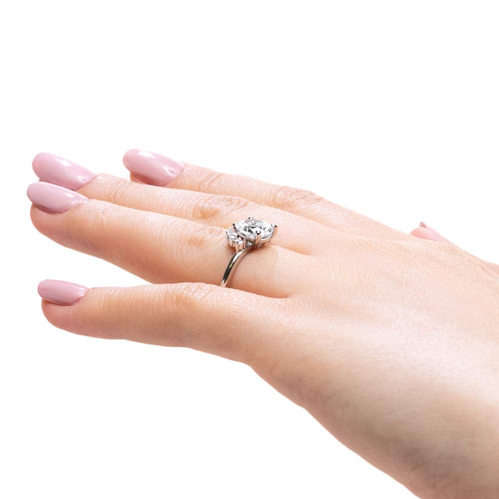 Shown with 1.5ct Oval Cut Lab Grown Diamond in 14k White Gold|Elegant vintage style half halo engagement ring with 1.5ct oval cut lab grown diamond in 14k white gold shown worn on hand sideview