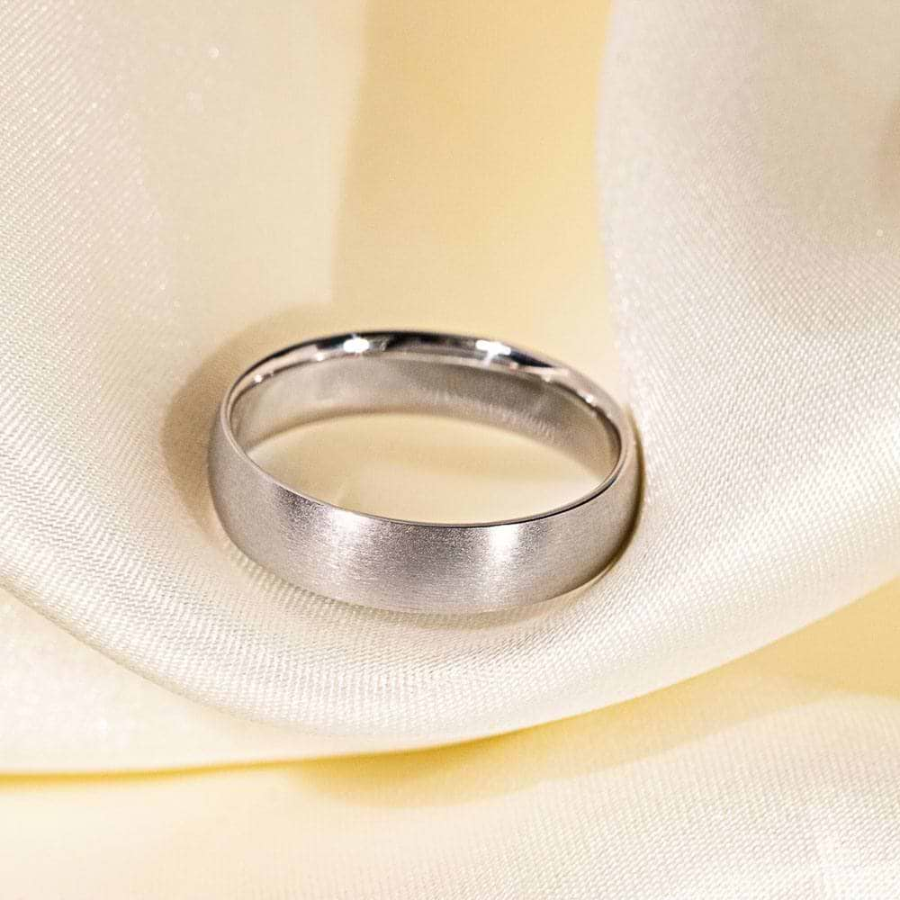 Canyon Wedding Band shown in a cross-satin finish, 5mm band width, recycled 14K white gold 