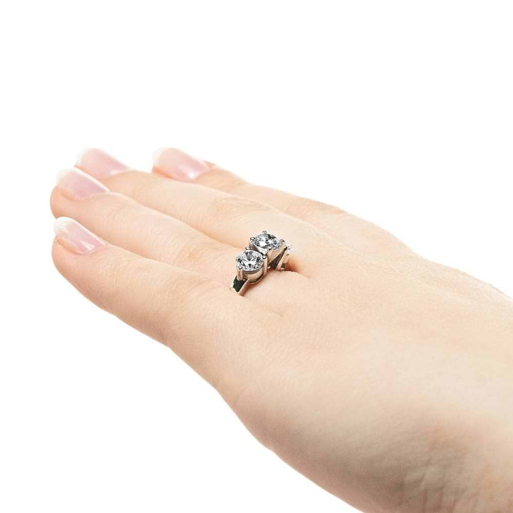 Shown with three Round Cut Lab Grown Diamonds in 14k White Gold|Three stone engagement with round cut lab grown diamonds in 14k white gold worn on hand