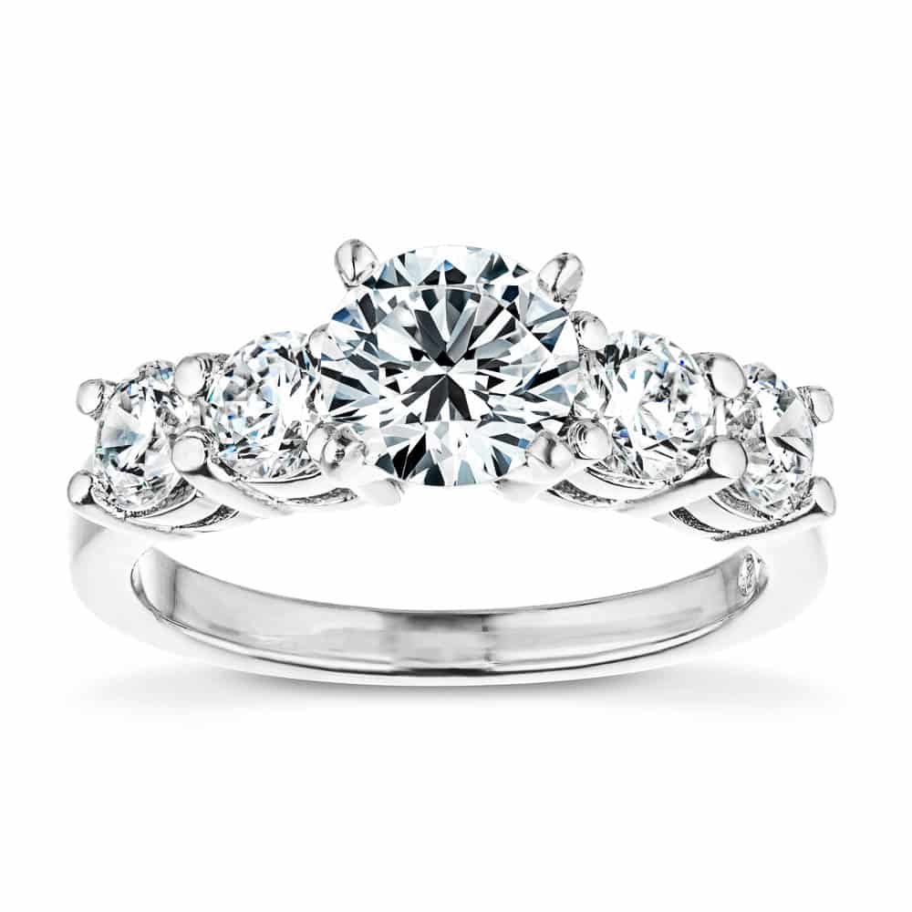 Shown with a 1ct Round Cut Lab Grown Diamond Center Stone amid four 0.25ct Diamond Hybrids in 14k White Gold