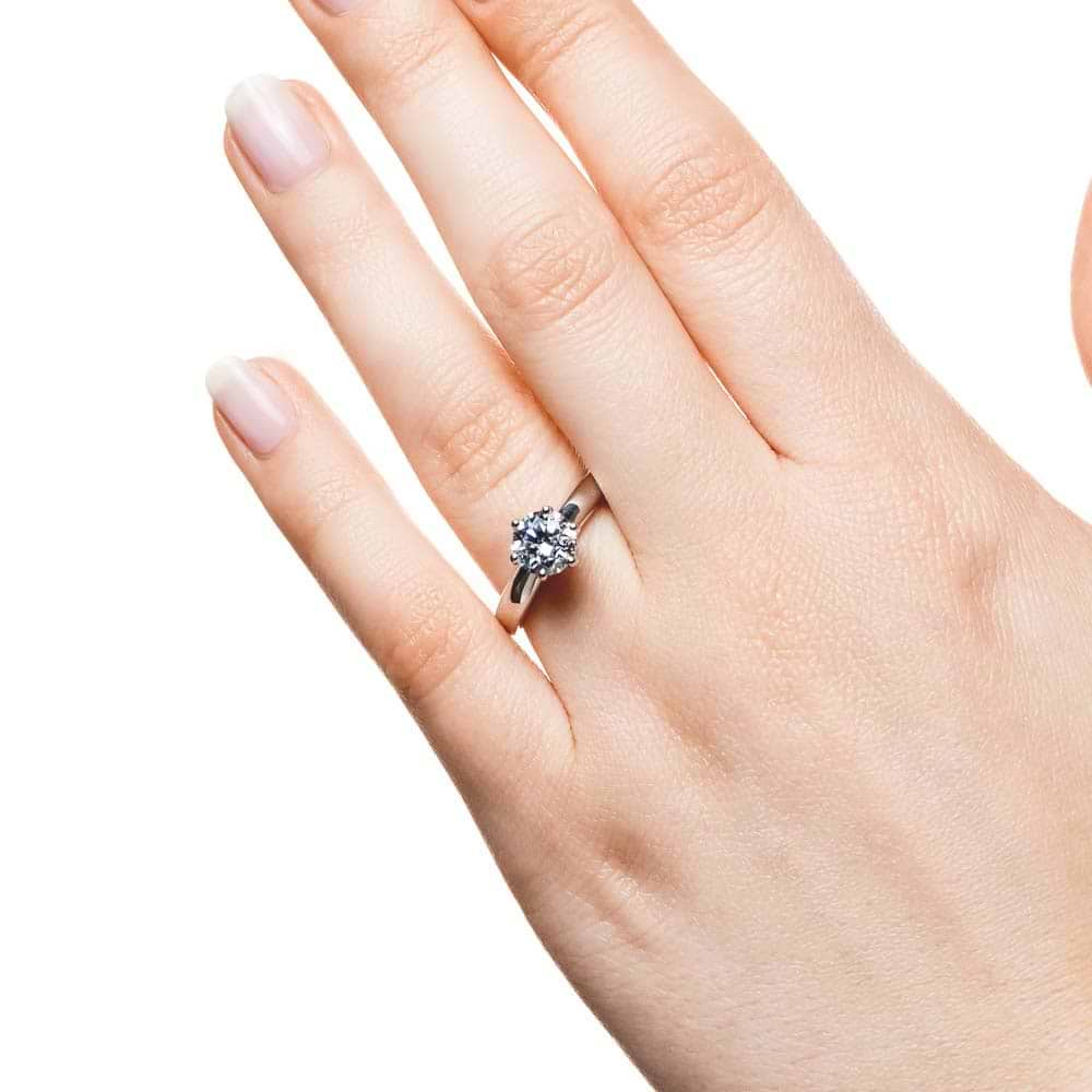 Shown with 1.5ct Round Cut Lab Grown Diamond in 14k White Gold|Solitaire engagement ring with 6 prong head set 1.5ct round cut lab grown diamond in 14k white gold shown worn on hand