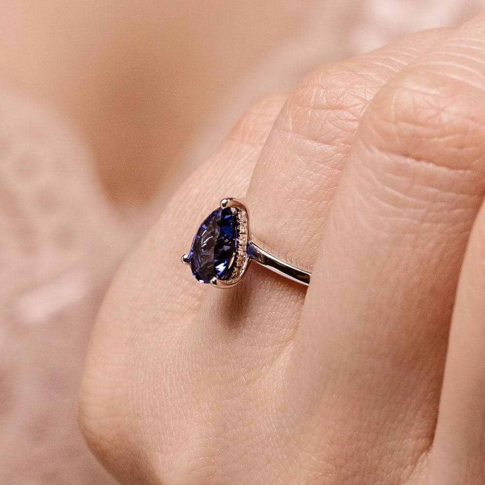 Shown with 1ct Pear Cut Lab Grown Blue Sapphire in 14k White Gold