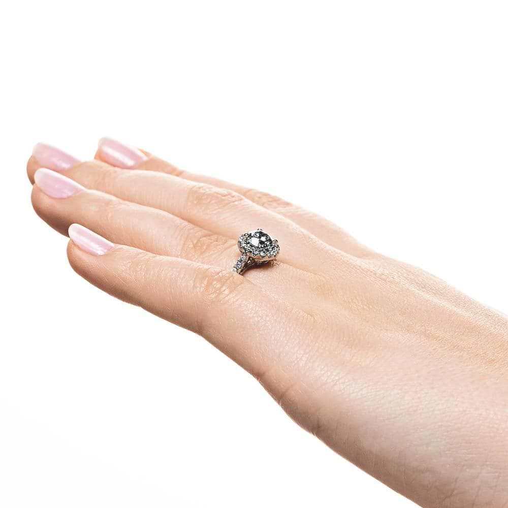 Shown with 1ct Round Cut Lab Grown Diamond in 14k White Gold|Diamond accented halo engagement ring with 1ct round cut lab grown diamond in 14k white gold shown on hand