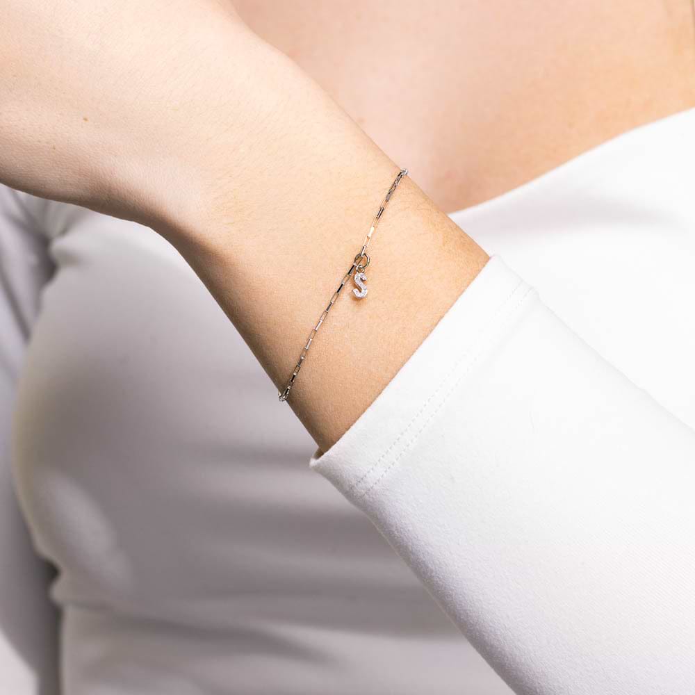 Shown in 14K White Gold|Elongagated Box Chain S Initial Bracelet in 14 Carat Gold with Lab Grown Diamonds by MiaDonna on a woman's wrist