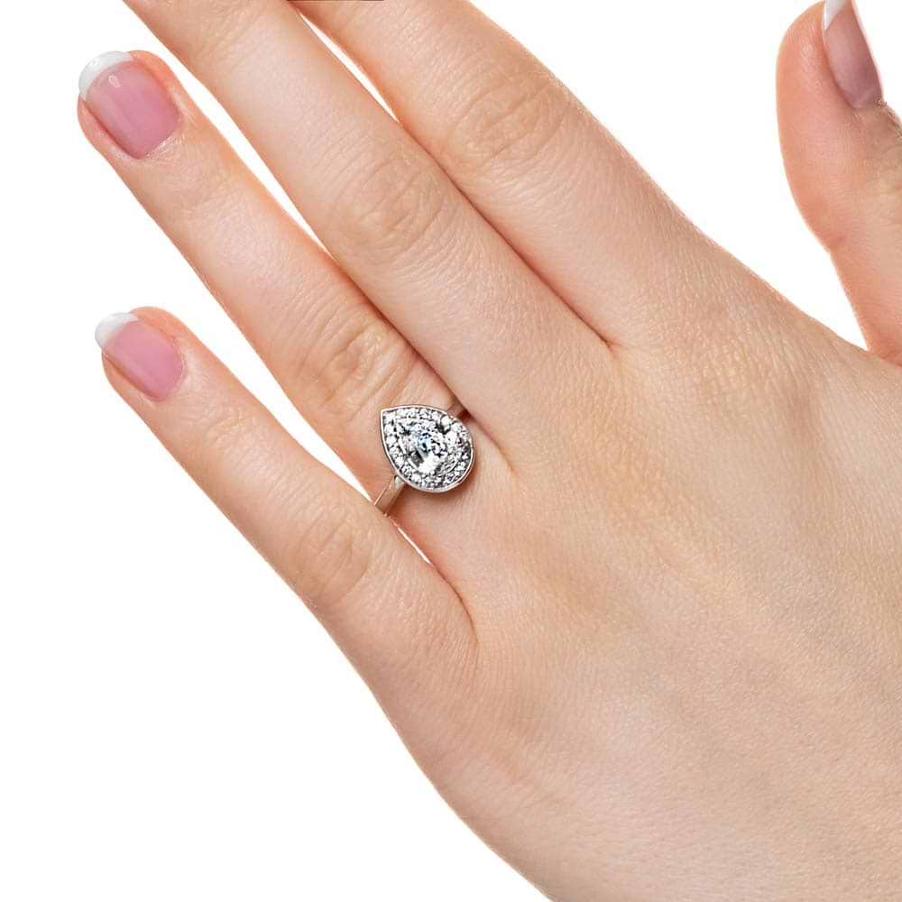 Shown with 1ct Pear Cut Lab Grown Diamond in 14k White Gold|Diamond halo engagement ring with 1ct pear cut lab grown diamond set in 14k white gold