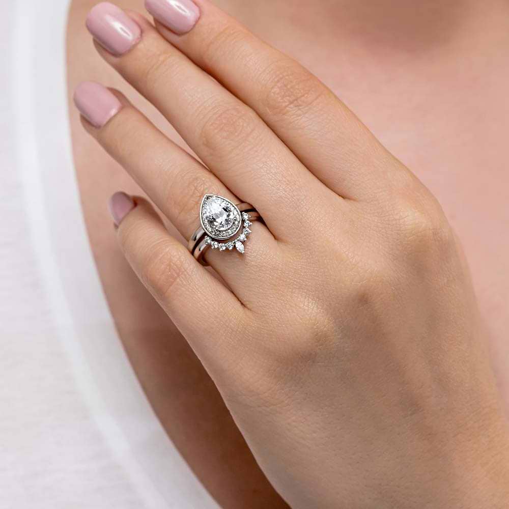 Also available in a set | Accented diamond v shape wedding band.