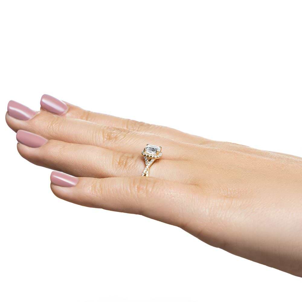 Shown with 1ct Cushion Cut Lab Grown Diamond in 14k Yellow Gold|Diamond halo engagement ring with crossover split shank band set with 1ct cushion cut lab grown diamond in 14k yellow gold shown worn on hand sideview