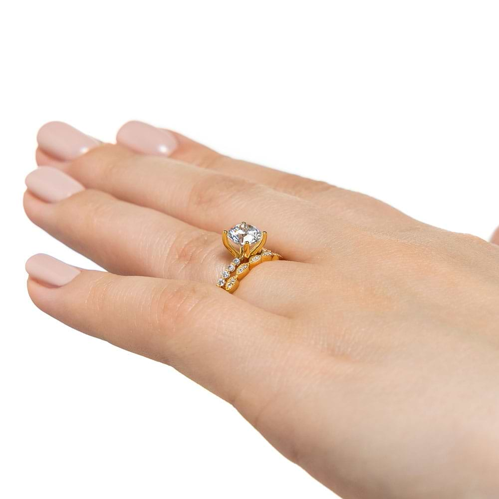 Set shown with a 1ct Round cut Lab Grown Diamond in 14k Yellow Gold