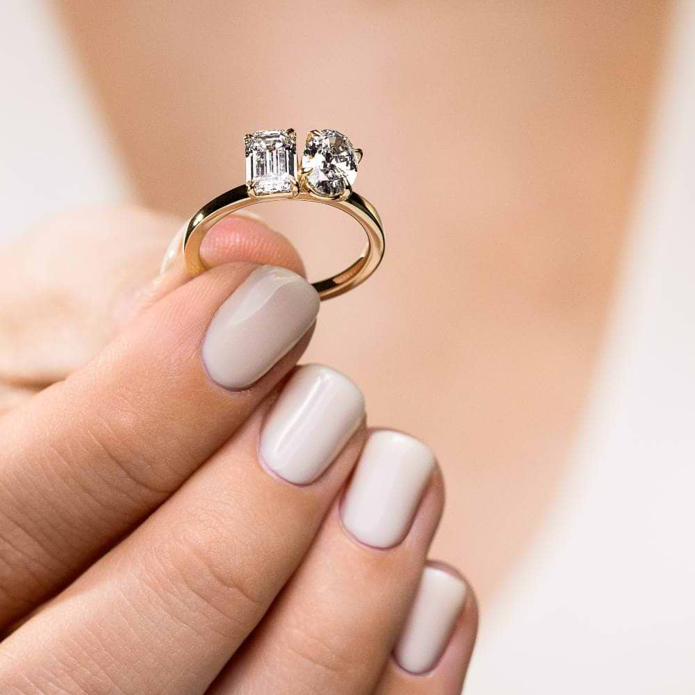 Shown In 14K Yellow Gold With An Emerald Cut and Oval Cut Lab Grown Diamond