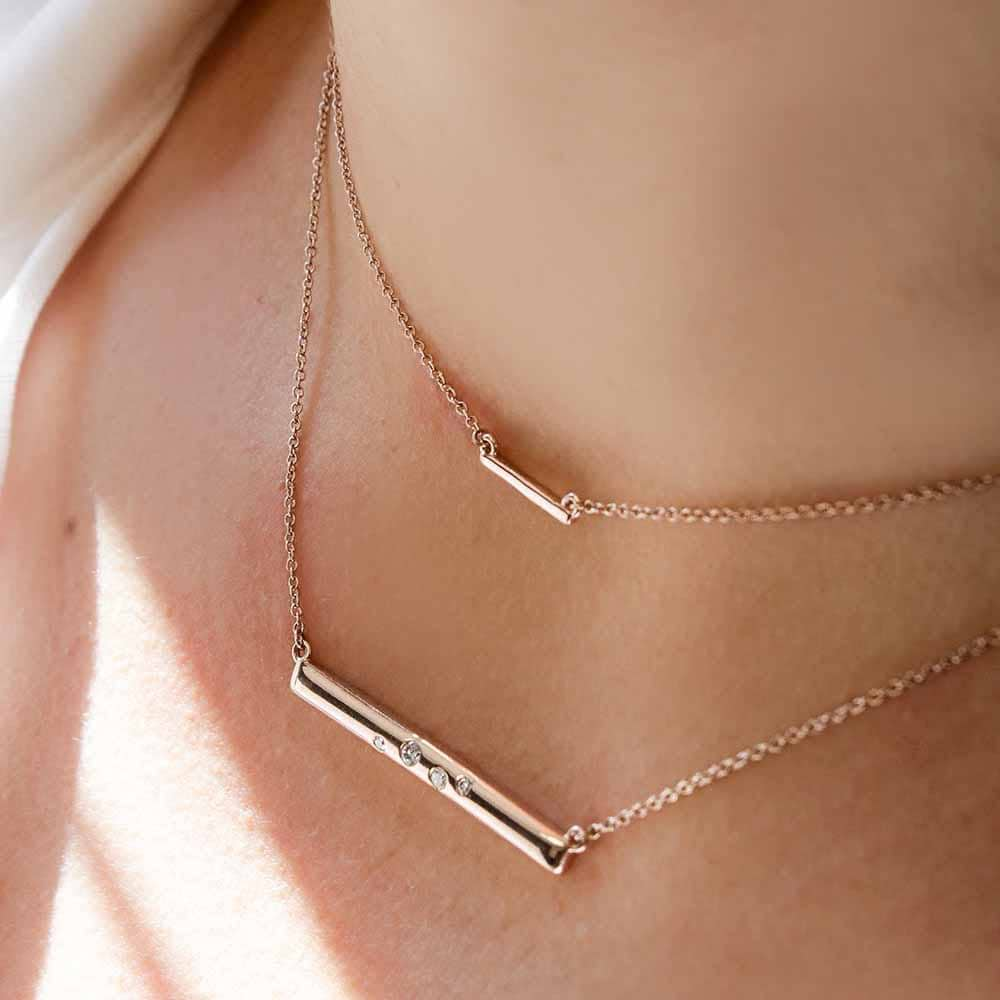 Featuring the Galaxy Bar Necklace in 14K rose gold &amp; the Diamond Bar Necklace (sold separately)