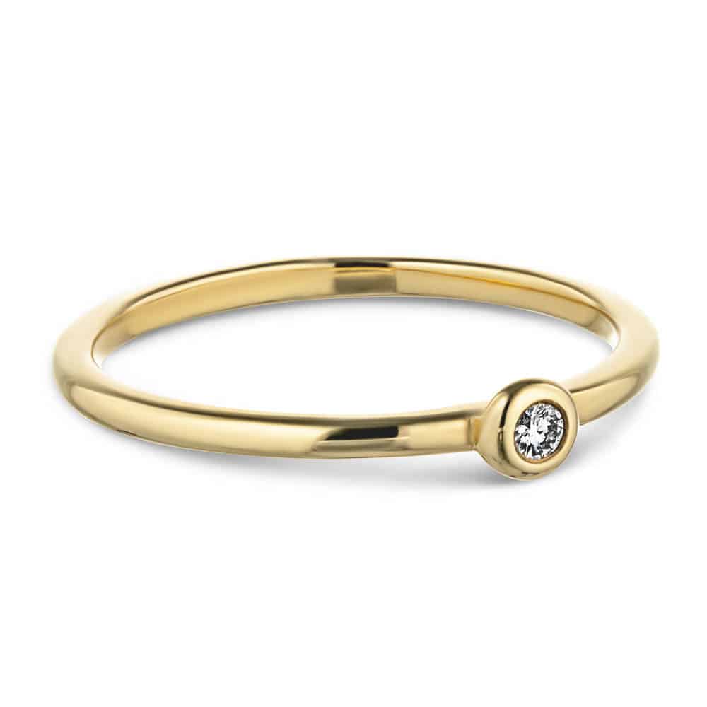 Shown with a 0.03ct recycled diamond in recycled 14K yellow gold 