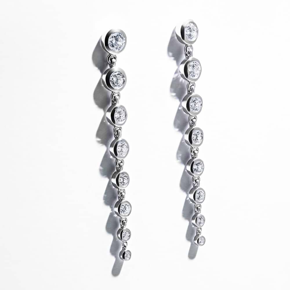 Shown in 14k White Gold|Beautiful graduated bezel drop earrings set with round lab grown diamonds in 14k white gold