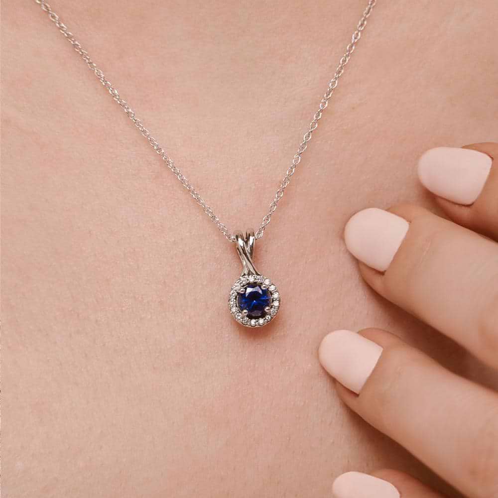 Set with a 1.7ct round lab-grown blue sapphire | blue sapphire pendant