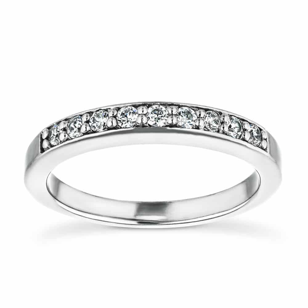 Diamond accented wedding band in recycled 14K white gold 