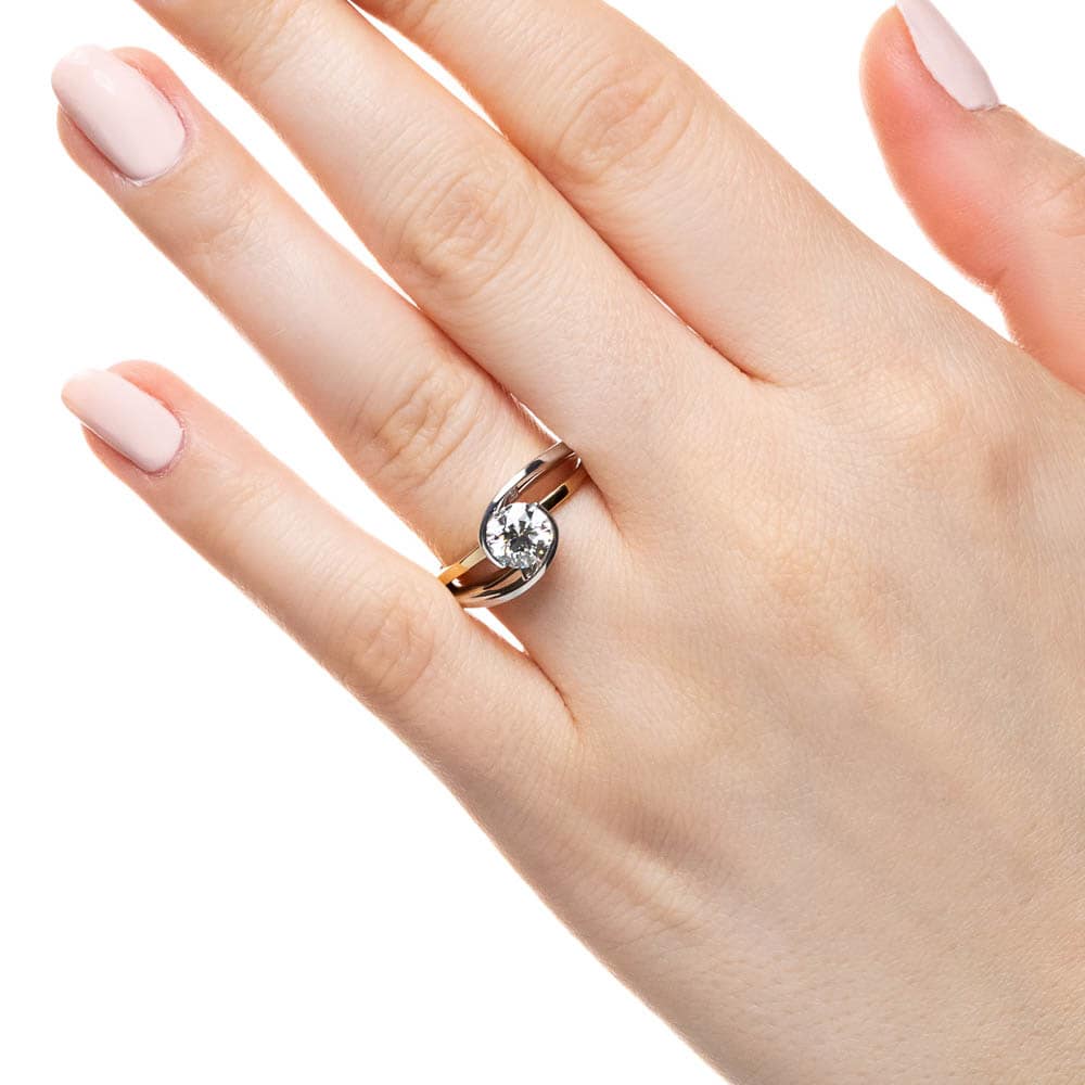 Shown with 1ct Round Cut Lab Grown Diamond in Two Tone 14k White & Yellow Gold|Modern two tone engagement ring with 1ct round cut lab grown diamond set in 14k white gold and 14k yellow worn on hand 