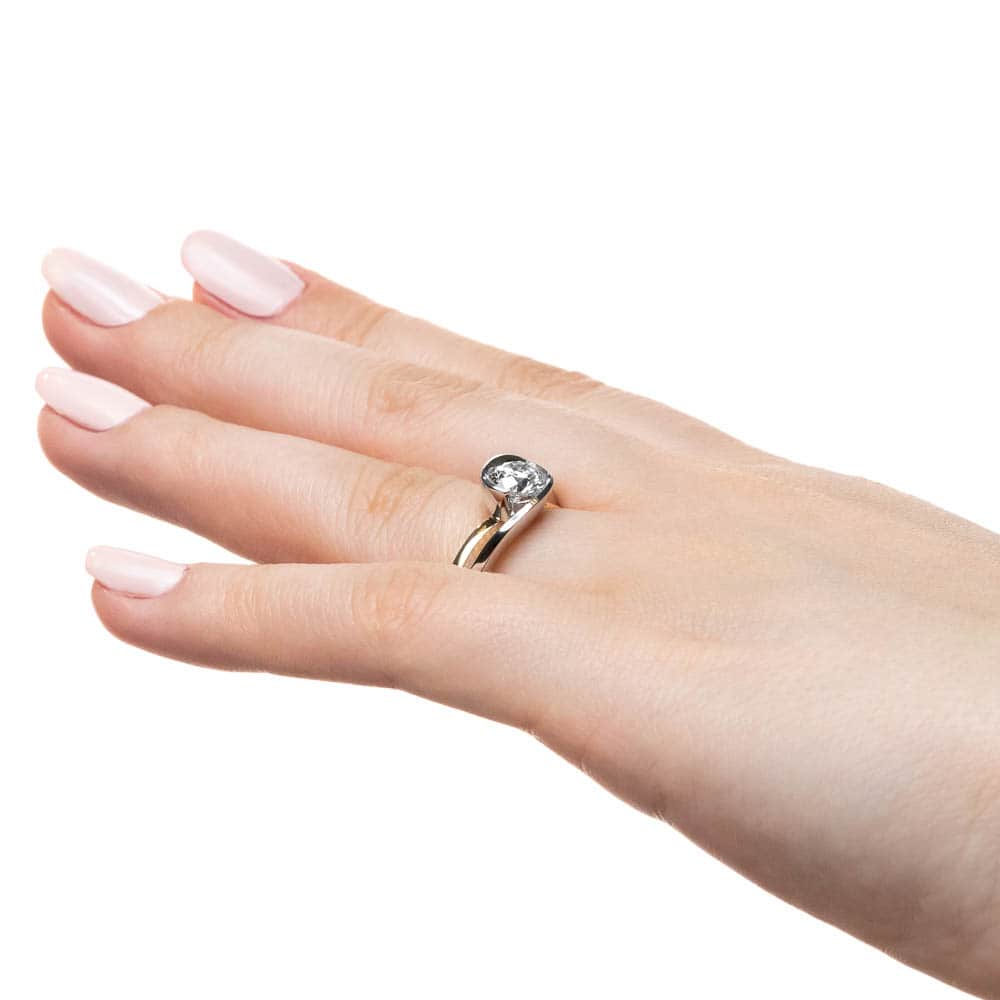 Shown with 1ct Round Cut Lab Grown Diamond in Two Tone 14k White & Yellow Gold|Modern two tone engagement ring with 1ct round cut lab grown diamond set in 14k white gold and 14k yellow worn on hand sideview