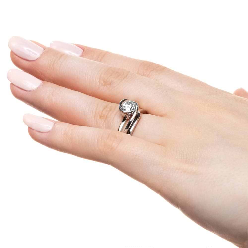 Shown with a 1.45ct Round cut lab-grown diamond in recycled 14K white gold with matching wedding band | two-tone wedding set shown with a 1.45ct Round cut Lab-Grown Diamond in recycled 14K white gold with matching wedding band