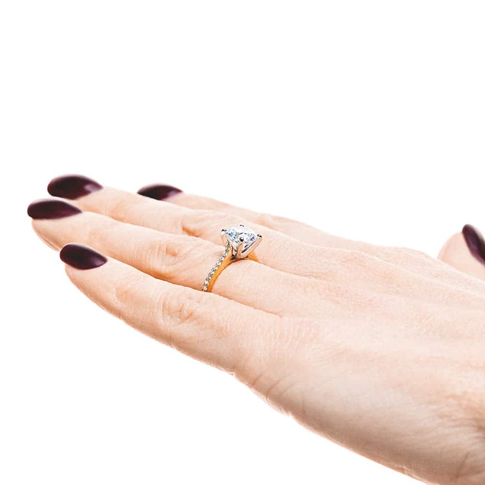 Shown with 1.5ct Round Cut Lab Grown Diamond in 14k Yellow Gold|Diamond accented engagement ring with 1.5ct round cut lab grown diamond set in 6 prong 14k yellow gold setting worn on hand sideview