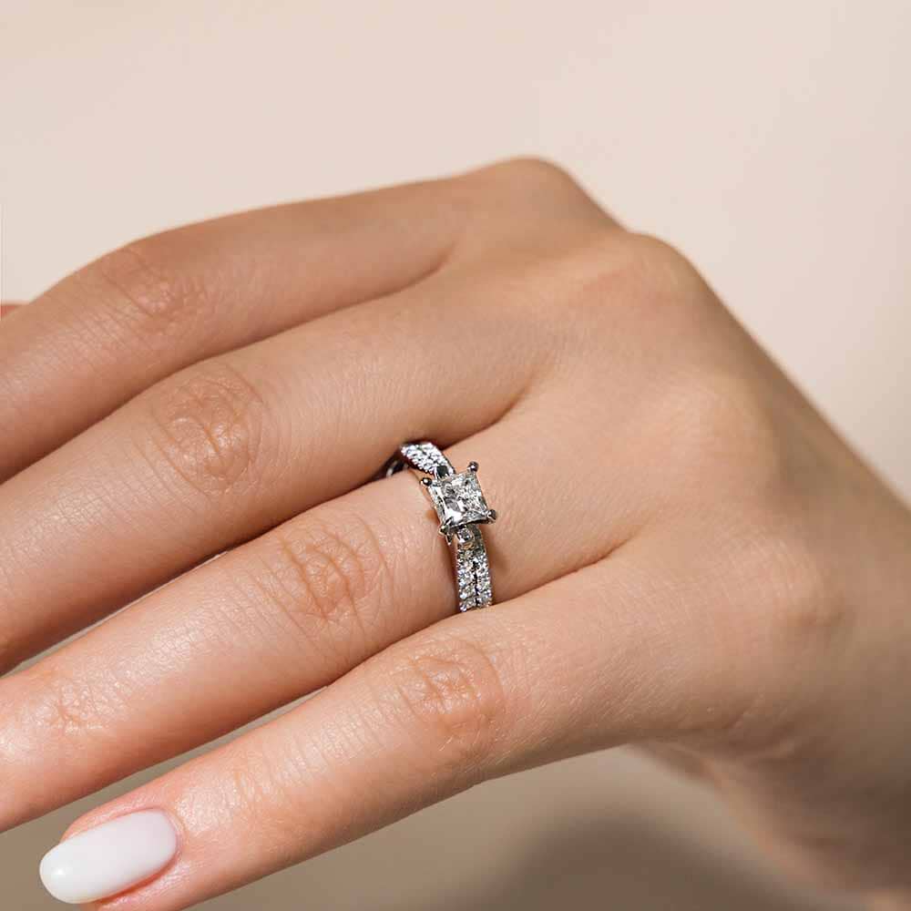Engagement Ring Shown with Matching Wedding Band Available as a Set for a Discount|Affordable lab grown diamond wedding ring set with 1ct princess cut diamond and accenting diamonds in 14k white gold